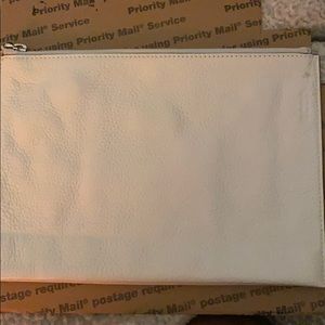 White clutch bag